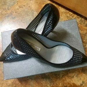 Via Spiga Women's laser cut black leather heels.